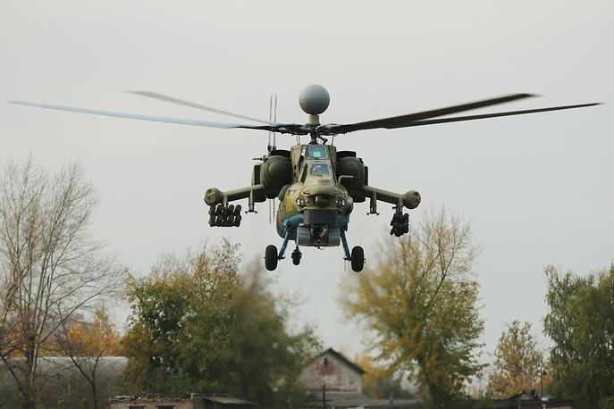 MOSCOW REGION, RUSSIA  OCTOBER 12, 2016: First upgraded Mil Mi-28N attack helicopter performs a test flight at the premises of the Mil Moscow Helicopter Plant, part of the Russian Helicopters Holding. Dmitry Serebryakov/TASS Ðîññèÿ. Ìîñêîâñêàÿ îáëàñòü. 12 îêòÿáðÿ 2016. Ïåðâûé îáðàçåö ìîäåðíèçèðîâàííîãî âåðòîëåòà Ìè-28Í âî âðåìÿ ñîâåðøåíèÿ ïåðâîãî ïîëåòà âî âðåìÿ ëåòíûõ èñïûòàíèé íà òåððèòîðèè Ìîñêîâñêîãî âåðòîëåòíîãî çàâîäà èì. Ì.Ë. Ìèëÿ õîëäèíãà "Âåðòîëåòû Ðîññèè" â Òîìèëèíî. Äìèòðèé Ñåðåáðÿêîâ/ÒÀÑÑ