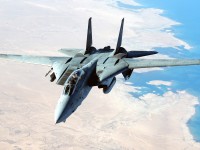 A US Navy (USN) F-14D Tomcat aircraft flies a combat mission in support of Operation IRAQI FREEDOM.