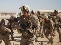 U.S. Marine Corps Sgt. Kyle Huth, a squad leader with Fox Company, 2nd Battalion, 8th Marine Regiment, Regimental Combat Team 7, participates in a mission rehearsal at Camp Bastion, Helmand province, Afghanistan, May 28, 2013. Marines and Sailors with the unit conducted the rehearsal to prepare for a partnered operation with Afghan National Army soldiers. (U.S. Marine Corps photo by Cpl. Kowshon Ye/Released)